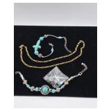 Gold Tone necklace with 2 silvertone bracelets
