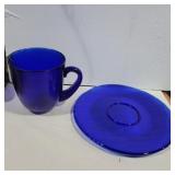 Blue glass textured pitcher 6.5in tall and blue