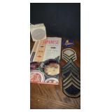 Japanese cookbook , sunglasses, speaker, military