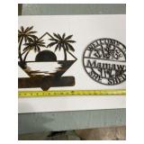 Two laser cut metal signs