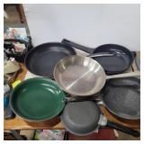 5 different frying pans and omelet pan
