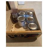 Wood crate with assorted latex paint for metal