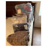 New pillows, comforters, cushion, and crocheted
