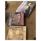 Two puzzles and Thomas Kincaid paint by numbers