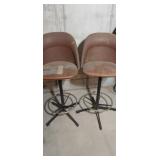 2, matching swivel bar stools , (need work)