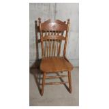 Ornate wooden armless chair made in Malaysia,