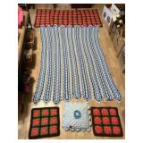 Group of handmade crochet throws and pillows