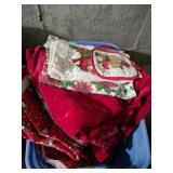 Tote of Christmas tablecloths hand towels
