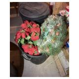 Can full of holiday decor, including wreaths,