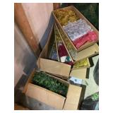 Two boxes full of garland