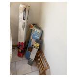 Several items in corner including rotisserie kit