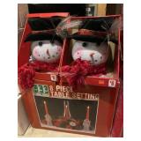 Eight piece holiday table setting and two light