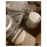 Ceramic canister set with metal latch lids