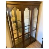 traditional dark wood curio or display cabinet