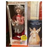 Animated Christmas display figurine, and lighted,