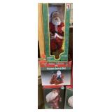 Three Santa figurines, one home for the holidays