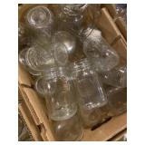 Variety of mason jars, and other glass jars of