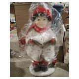 Singing boy figurine