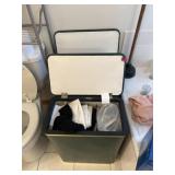 Two clothing hampers with towels etc. contents