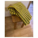 End table and knitted blanket