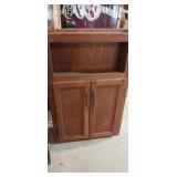 Overhead bathroom cabinet