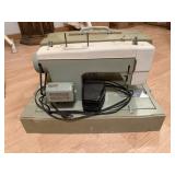 Vintage Sears Kenmore sewing machine with foot