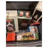 Tote full of various Christmas figurines and