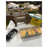 Lots of various toys, including cow bank, vintage