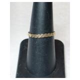 Gold serpentine ring  size 7 marked 14k.   .025oz