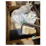 Fabric strip remnants, old book and other