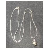 Silver chain Pearl pendant Marked 925.   .145oz