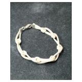 Silver knotted bracelet marked 925 (milor).