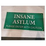 Cast iron insane asylum sign 10.5 x5
