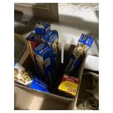 Rolls of parchment paper and cling wrap