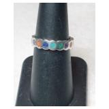 Silver multi-color band marked CCO 925 size 6.