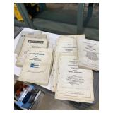 Evinrude parts catalogs spanning from 1958 to