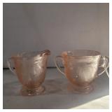 Pink depression sugar and creamer with flower