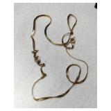 14k scrap gold herringbone chain marked 14k.