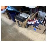 Take all underneath table, VCR, decor, towels,