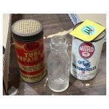 Old automotive collectibles cans and bottle