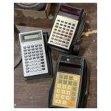 3 vintage Texas Instruments calculators with