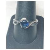 Silver bluestone ring marked 925 size 9.   .085oz