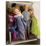 Flat of various Barbie dolls, and frozen dolls