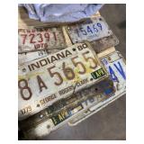 Motorcycle and vehicle plates spanning from 1976