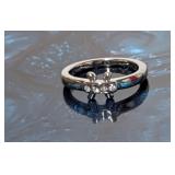 Pretty Little Accent Ring With Some Clear Stones.