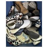 Tote of mixed kids shoes, slippers, boots and
