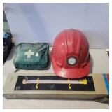 Work light, hard hat, and first aid