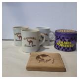 Camel mugs, wooden cigarette holder, and tin