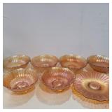 5 marigold carnival glass bowls and 1 flat