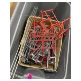 Tote full of pegboard, accessories, and hangers